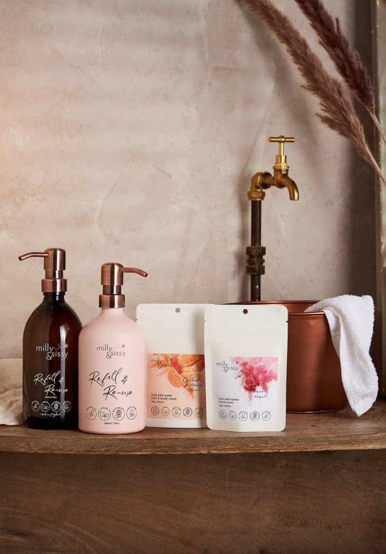 milly and sissy zero waste plastic free eco bathroom handwash body wash refill set - great for moving to a more sustainable bathroom with one amber glass bottle (for hand wash) and one blush aluminium bottle (for the shower) and two compostable refill pouches that just need mixing with water to create beautiful natural hand wash and hair and body wash that is vegan and 99% natural #plasticfre #zerowaste #bathroom #handwash #bodywash #shampoo