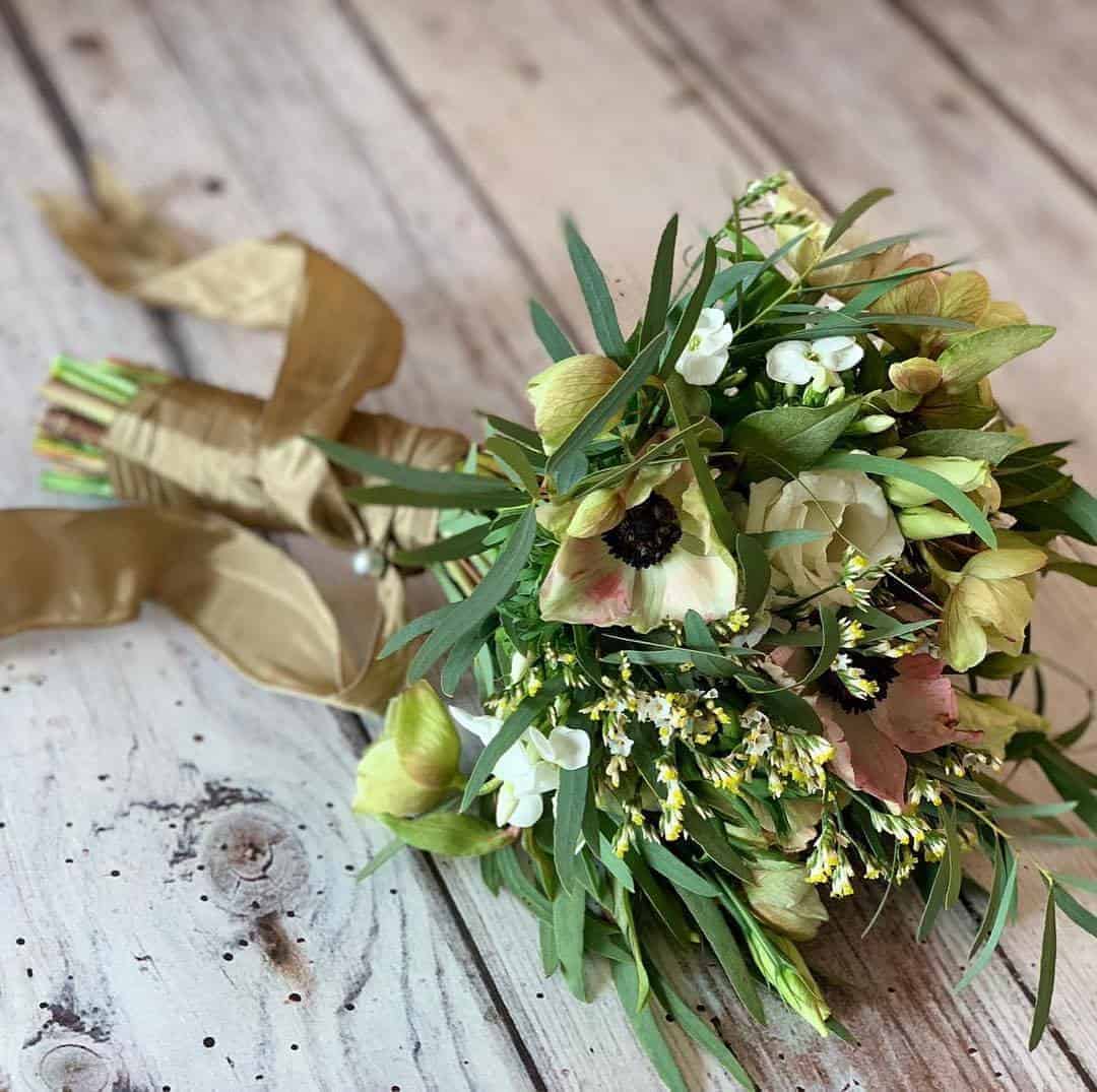 love this hand tied posy with spring flowers made at a Sussex Flower School workshop. click through to find out more and to discover founder of the school, Georgia Miles' inspirations, simple pleasures and local loves