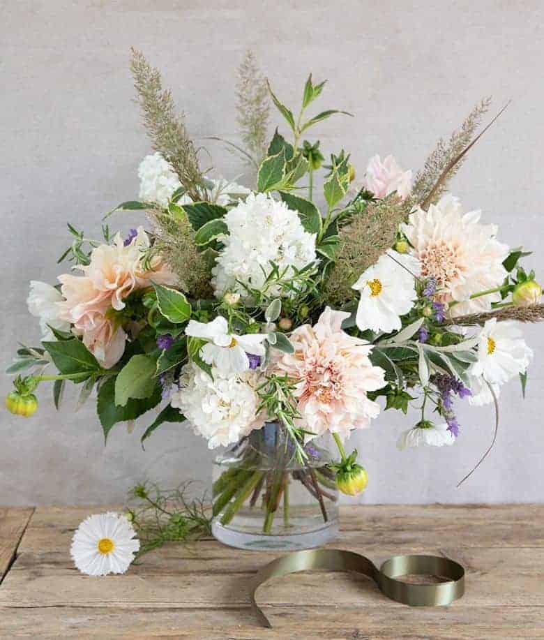 love this cafe au lait dahlia bouquet by The Real Flower company including cafe au lait dahlia as well as cosmos, hydrangea, lavender as well as herbs and foliage all grown on their Hampshire farm. Click through to get all the info you need to send this beautiful british bouquet to someone special