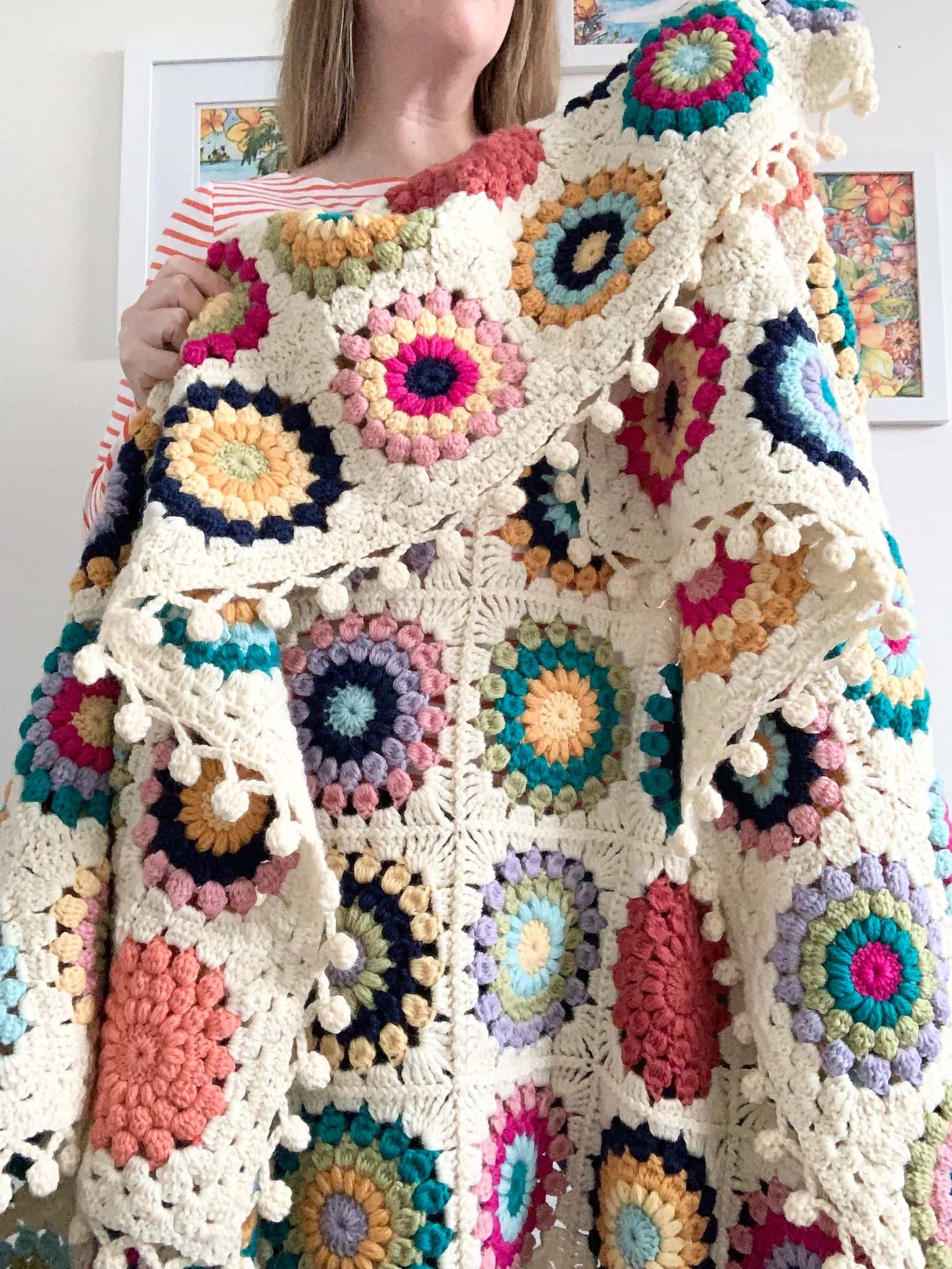 island time sunburst granny square crochet blanket pattern by Mallory Krall, available for free online or to buy as a printable PDF on Etsy. Click through to get your pattern now