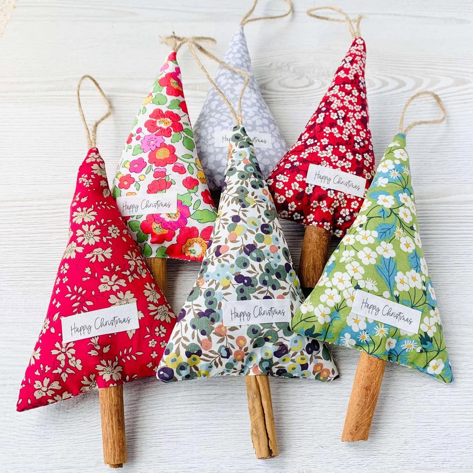 fabric scandi inspired christmas tree decorations with cinnamon stick trunks sewing pattern