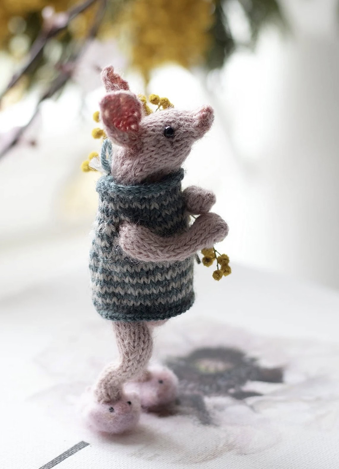 Piglet knitting pattern by Claire Garland aka Dot Pebbles Knits - part of her Winnie the Pooh collection that includes Eeyore and Honey Bear inspired by Pooh Bear. All lovable and easy to knit. Click through to get your PDF download pattern today and start knitting!